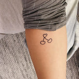 Tatouage coeur cerise