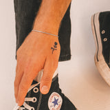 Petit tatouage rempli de rose