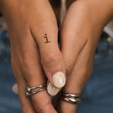 Tatouage "i"