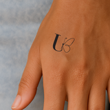 Tatouage papillon avec initiales (A-Z)