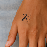 Tatouage papillon avec initiales (A-Z)