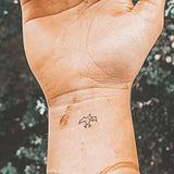 Petit tatouage de ptérosaure