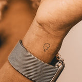 Petit tatouage de stégosaure