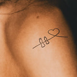 Hirondelles et tatouage de coeur