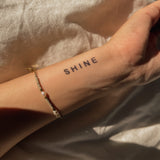 Tatouage shine