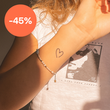 Tatouage coeur étroit et ouvert 