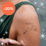 Tatouage de renne avec guirlande lumineuse