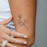 Tatouage de fleur de naissance liseron de septembre