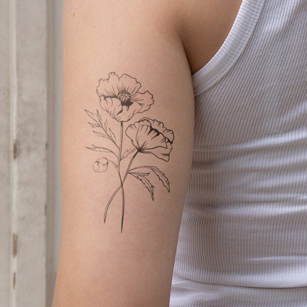 Tatouage de fleur de naissance coquelicot d'août