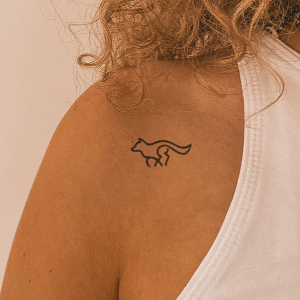 Tatouage de loup qui court 