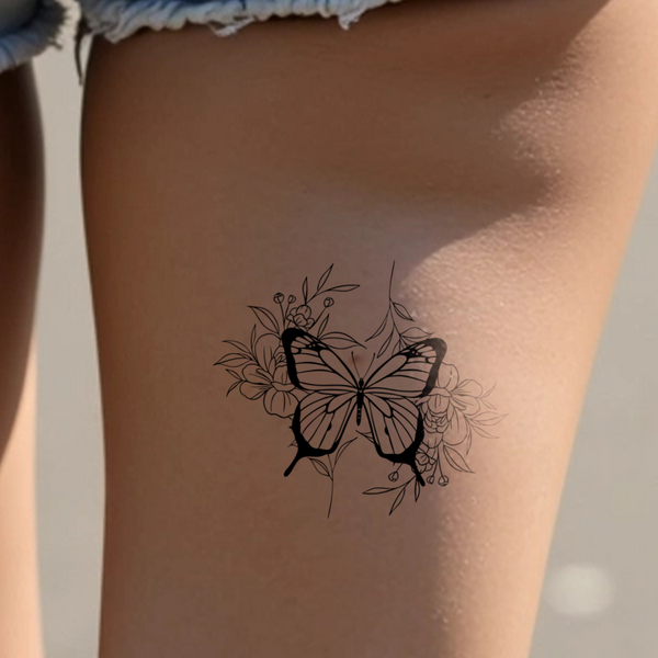 Tatouage Papillon Entouré de Fleurs