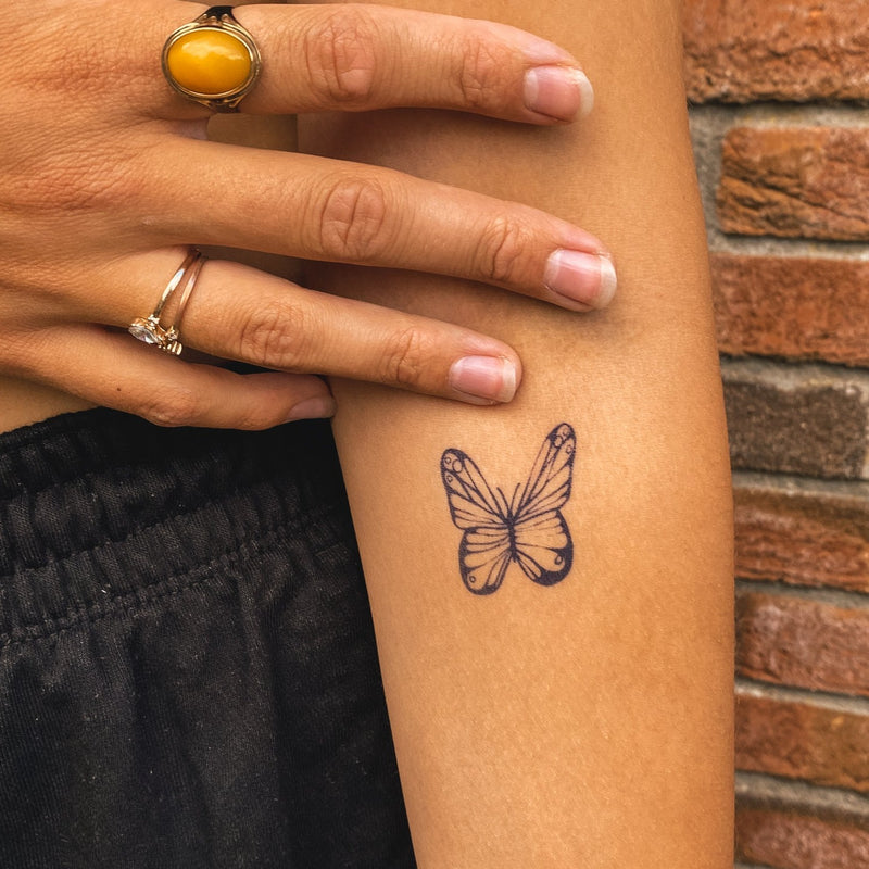 Beau tatouage papillon 